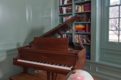 Traditional Colonial Piano That Ties This American Colonial Home's Study