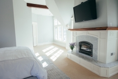 French Tudor Inspired Master Bedroom with Fireplace