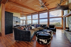 Mountain Inspired Mountain Home Living Room - Oversized Windows & Hardwood Floors